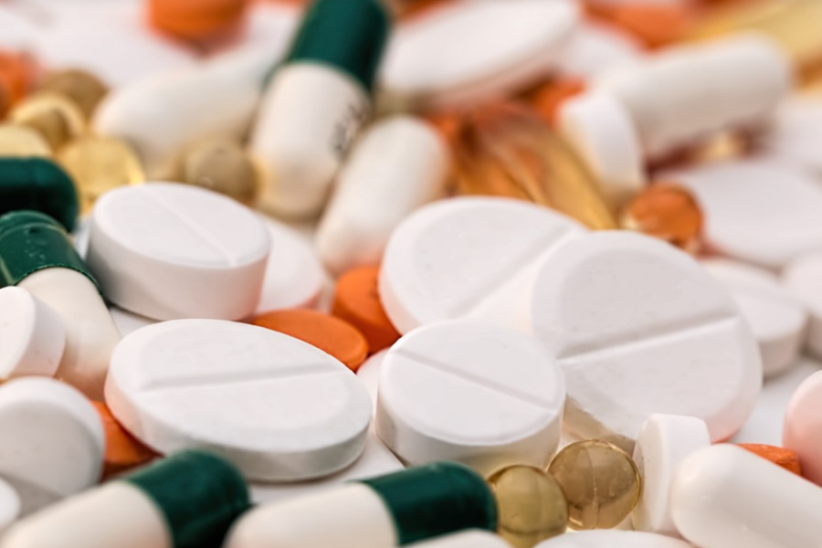 Antibiotic pills in a pile.