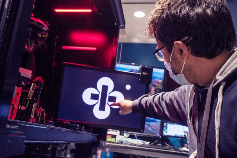 scientist pointing to laptop